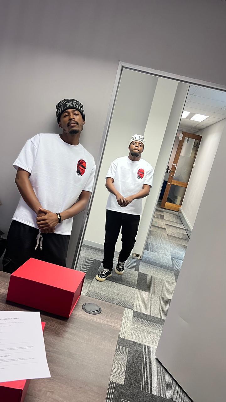 Artists in mirrored room